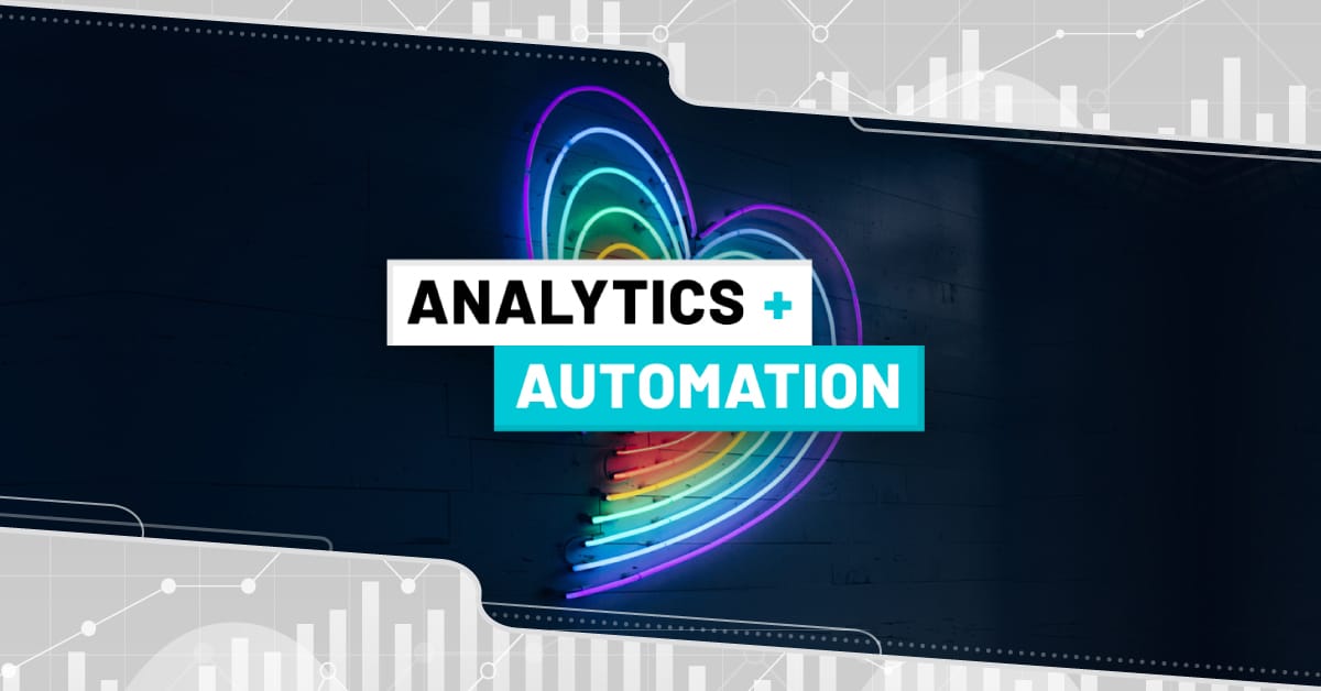 A neon heart with rainbow colors is displayed on a dark background. Overlaid text reads "Analytics + Automation" in bold typography. The background features faint graphs and charts.