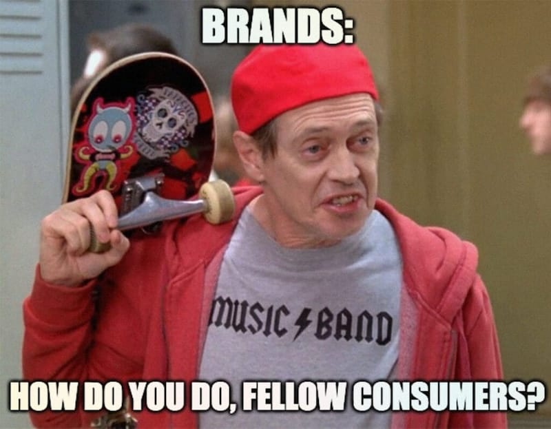 A man in red cap holds a skateboard with cartoon graphics. His shirt, labeled "Music Band," suggests he's mastered the art of copywriting. Text above reads "BRANDS:" and below asks, "HOW DO YOU DO, FELLOW CONSUMERS?